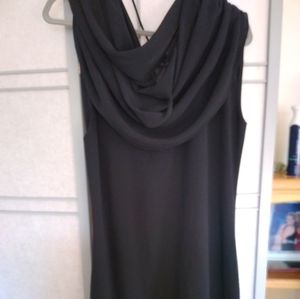 Draped neckline adds to the drama